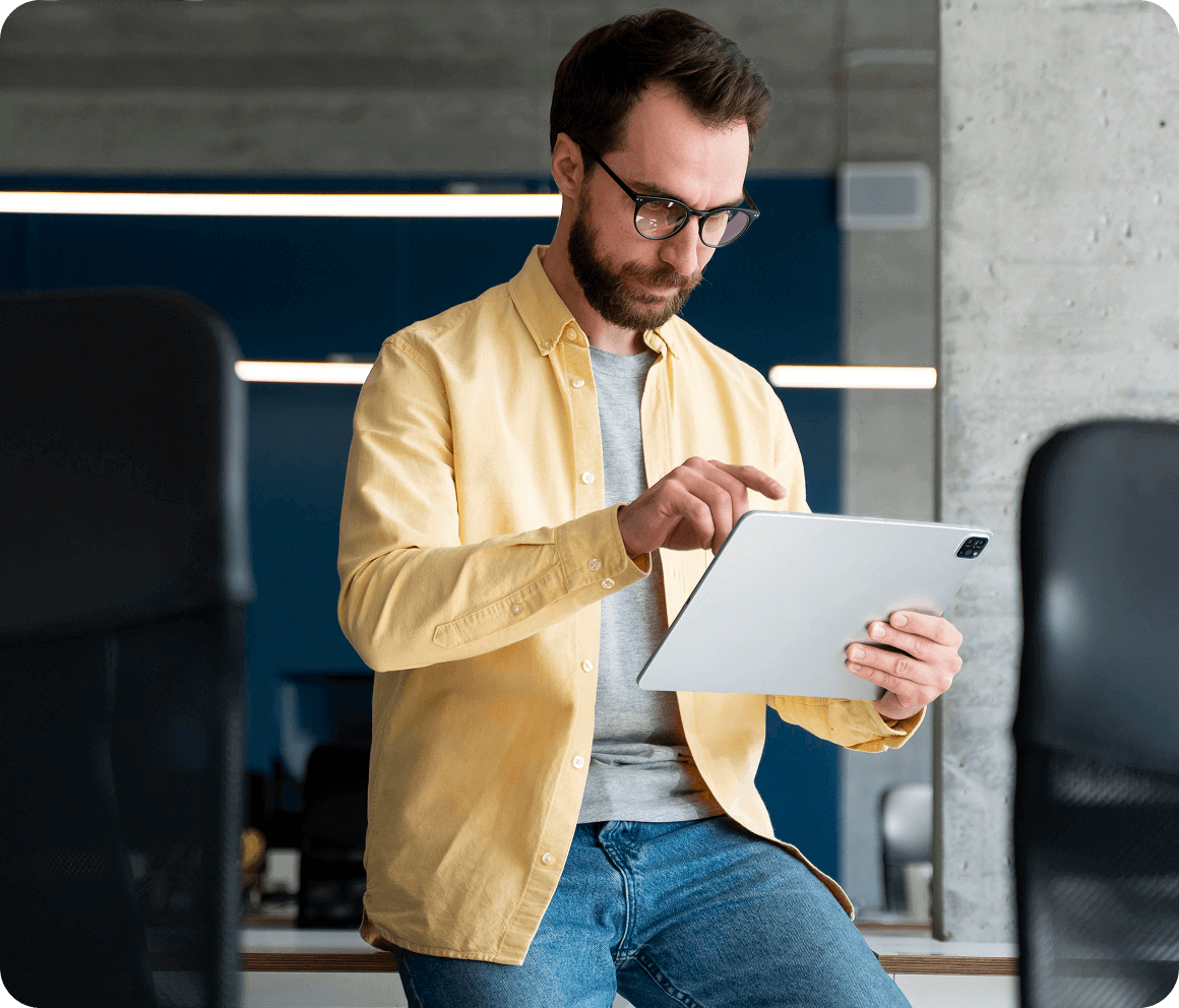 Compliance and Safety Training Simplified for Employees Employee reviewing compliance and safety training materials on laptop